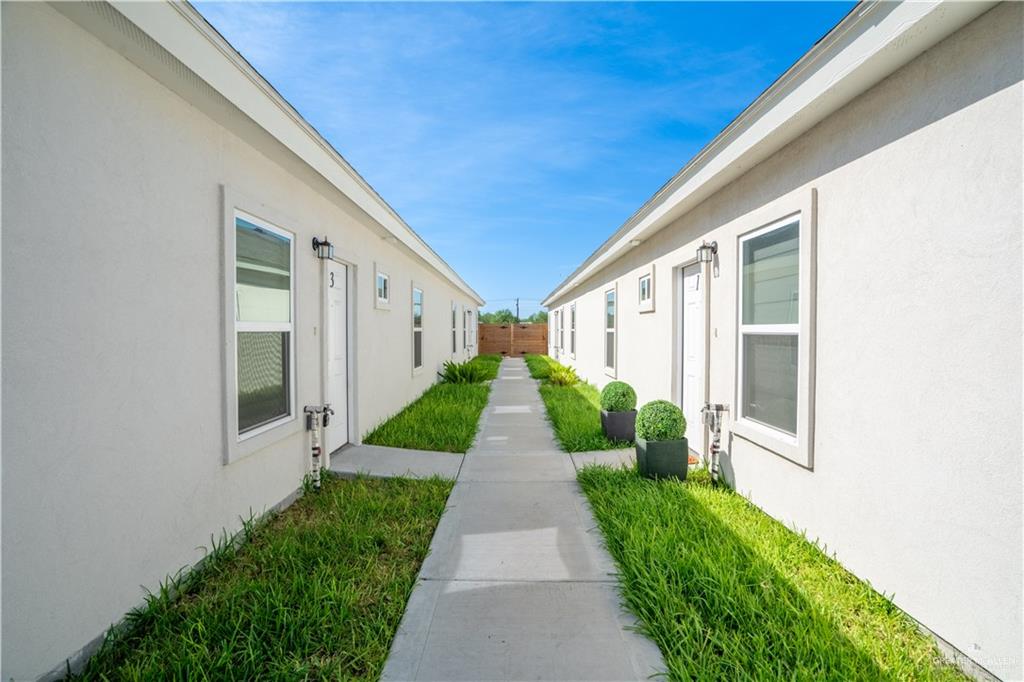 12509 North 40th Street, Unit 4 Edinburg, TX 78541 - Photo 26 of 27 a view of a garden with pathway