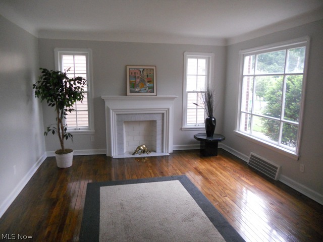 1260 Homestead Road South Euclid, OH 44121 - Photo 3 of 13 Spacious Living Room with Gleaming Hardwood Floors