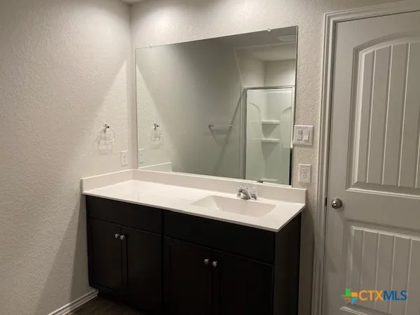 a view of a room with rack on the wall