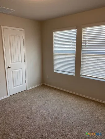 a bathroom with a bathtub and a toilet