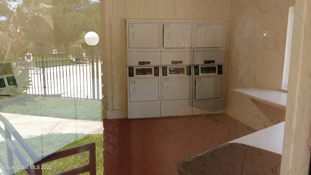 a view of a room with a window