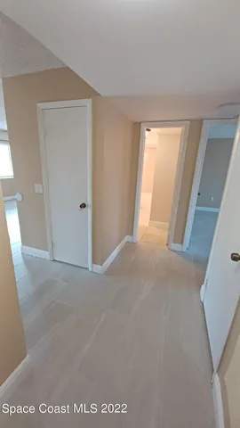 a view of a room with a window