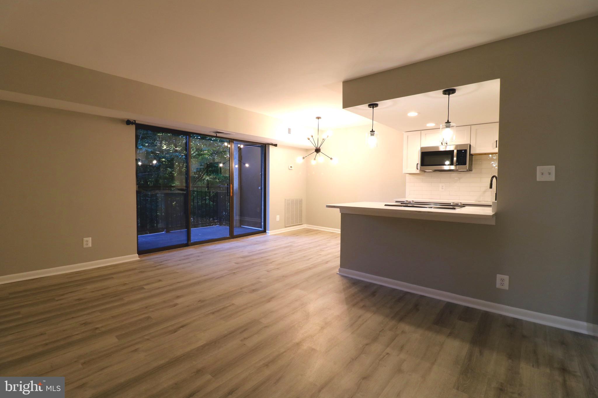 2249 Castle Rock Square, Unit 11C Reston, VA 20191 - Photo 13 of 26 a bathroom with a sink and a mirror