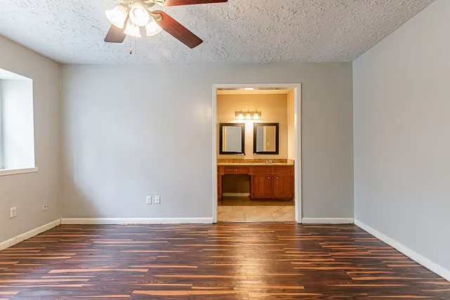 a view of a livingroom with wooden floor
