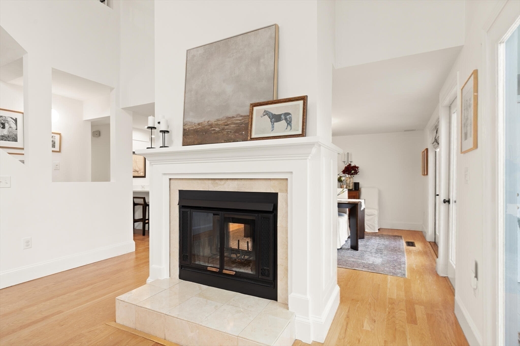 300 Willow Street, Unit 3 Hamilton, MA 01982 - Photo 12 of 39 a living room with furniture and a fireplace