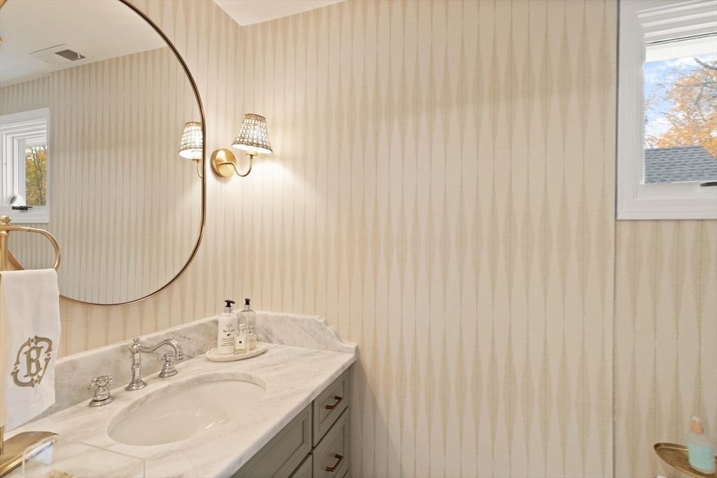 300 Willow Street, Unit 3 Hamilton, MA 01982 - Photo 13 of 39 a bathroom with a sink and a mirror