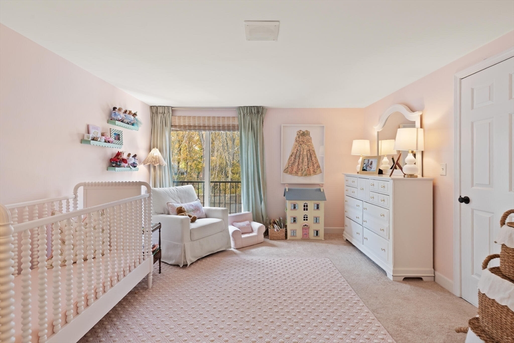 300 Willow Street, Unit 3 Hamilton, MA 01982 - Photo 22 of 39 a bedroom with furniture and a large window