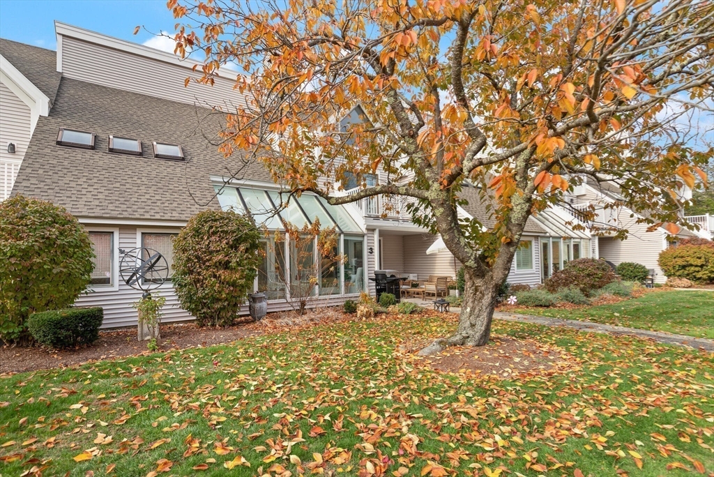 300 Willow Street, Unit 3 Hamilton, MA 01982 - Photo 35 of 39 a backyard of a house with outdoor seating