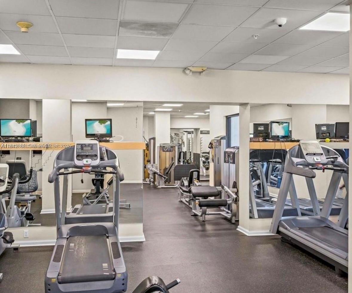 Brickell Miami, FL 33129 - Photo 7 of 8 a view of a room with gym equipment