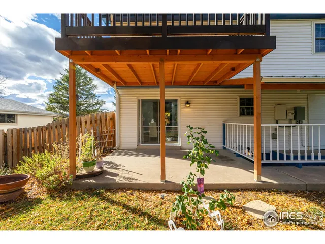 a view of a backyard with a small cabin
