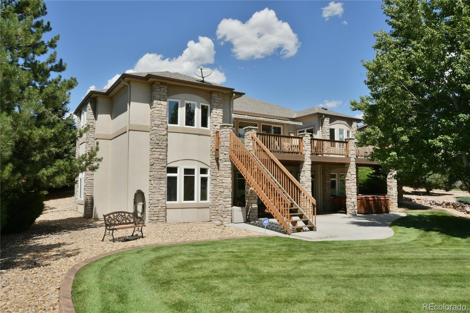 5283 Pinyon Jay Road Parker, CO 80134 - Photo 10 of 12 a view of a house with a park