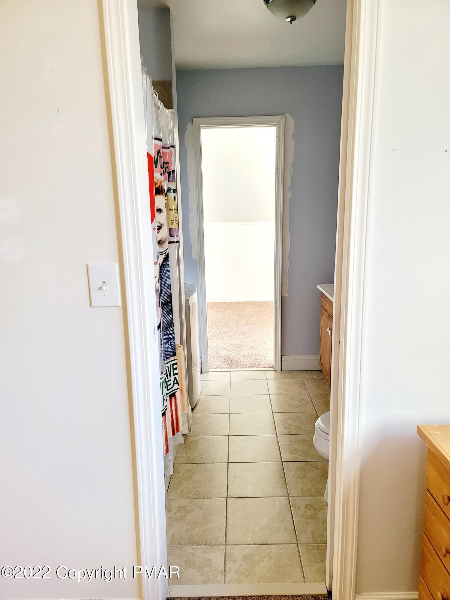 132 Rodeo Drive Hawley, PA 18428 - Photo 18 of 26 a view of an entryway door