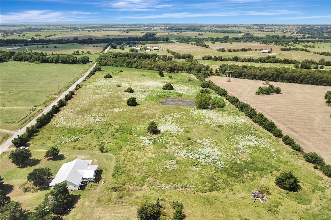 8515 Sandy Hill Road Brenham, TX 77833 - Photo 2 of 25 Aerial overview of property's location with rural landscape