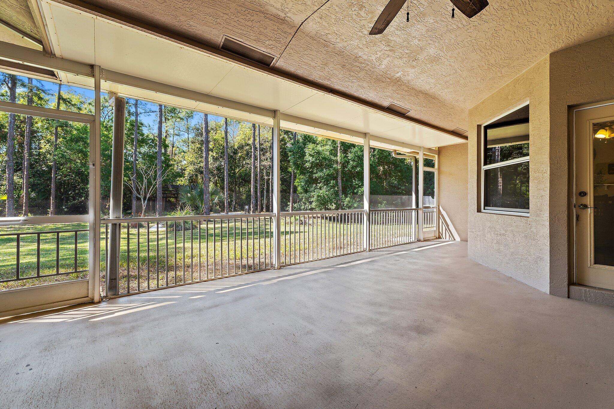 9608 Mockingbird Trail Jupiter, FL 33478 - Photo 18 of 48 Screened porch