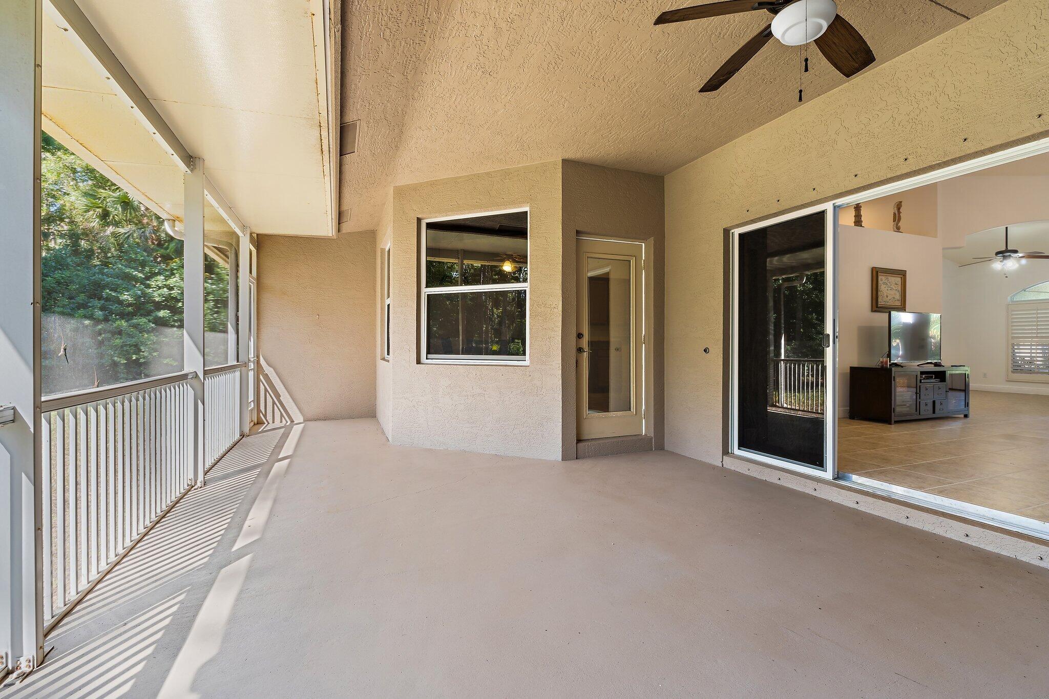 9608 Mockingbird Trail Jupiter, FL 33478 - Photo 19 of 48 Screened porch