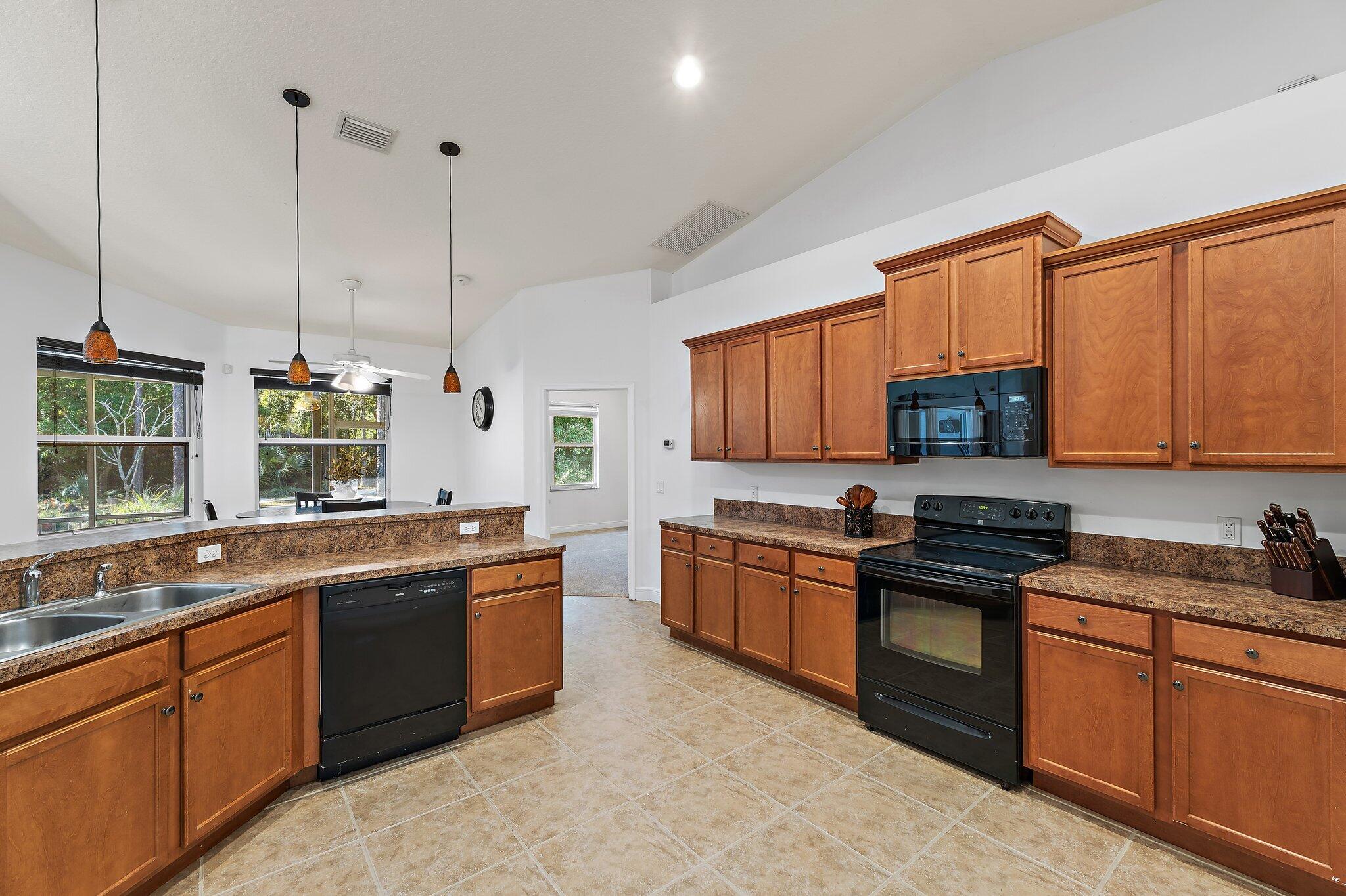 9608 Mockingbird Trail Jupiter, FL 33478 - Photo 22 of 48 Kitchen