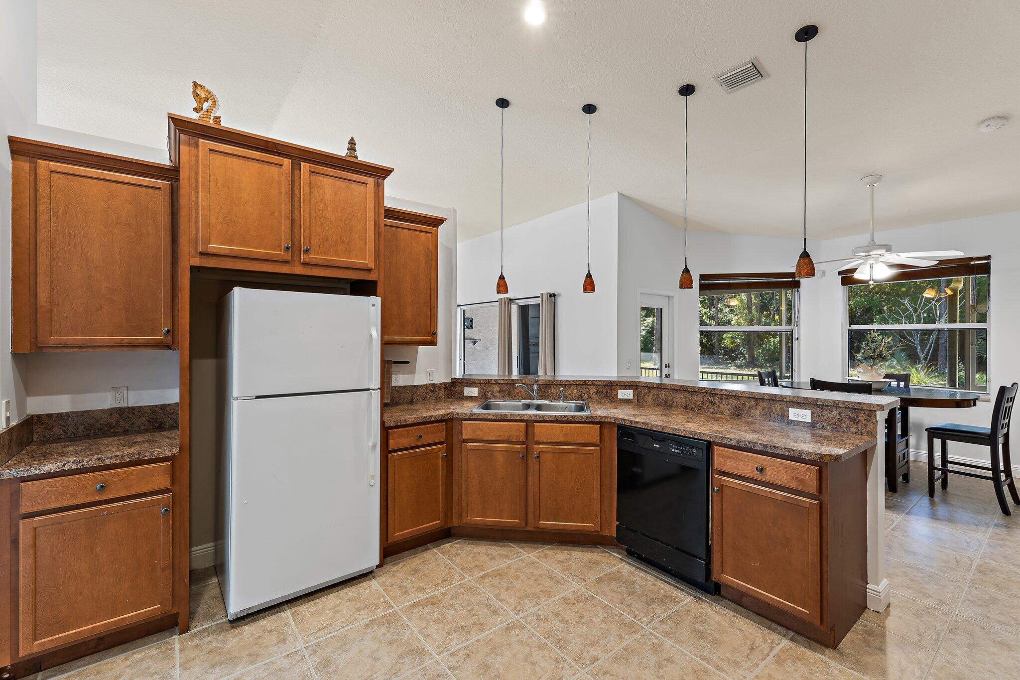 9608 Mockingbird Trail Jupiter, FL 33478 - Photo 23 of 48 Kitchen - eat in dining