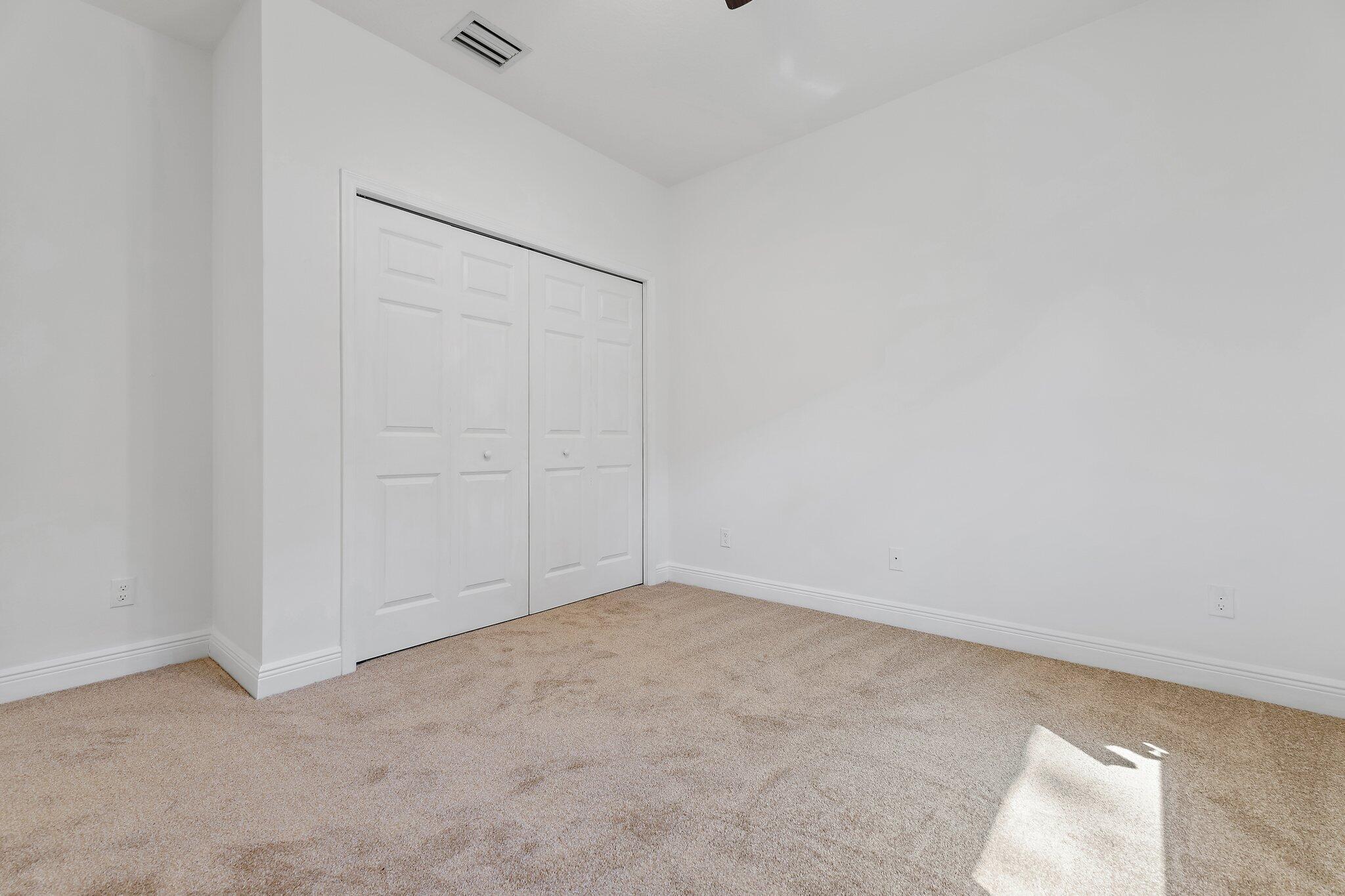 9608 Mockingbird Trail Jupiter, FL 33478 - Photo 32 of 48 Guest bedroom