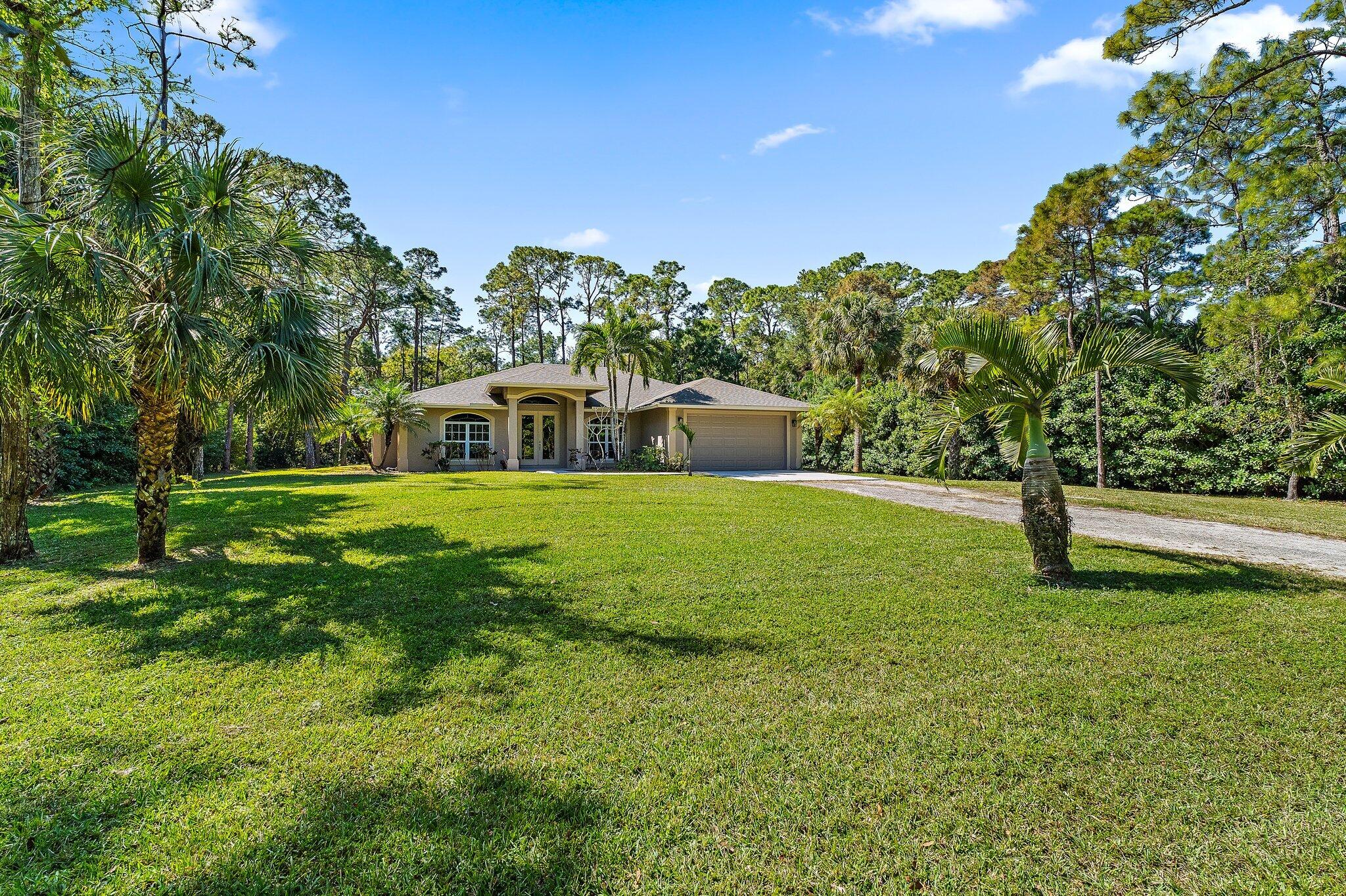 9608 Mockingbird Trail Jupiter, FL 33478 - Photo 6 of 48 From NE corner of lot