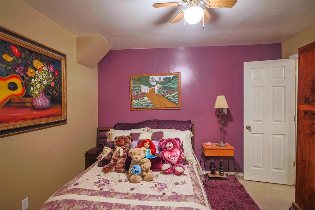 309 Tejas Trail Springtown, TX 76082 - Photo 22 of 40 a bedroom with a bed and a painting on the wall