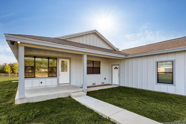 a view of a backyard with garden