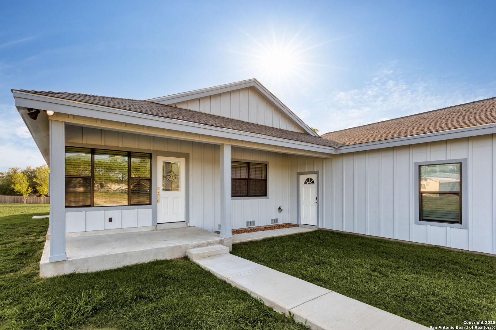 a view of a backyard with garden