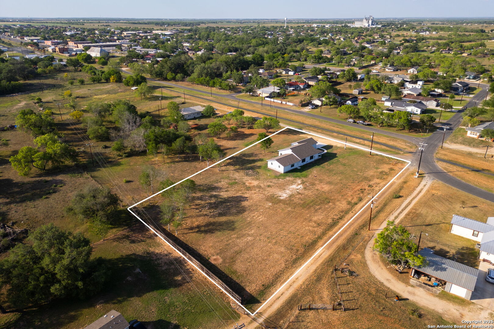 310 Creek Lane Poth, TX 78147 - Photo 15 of 32 an aerial view of residential houses with outdoor space