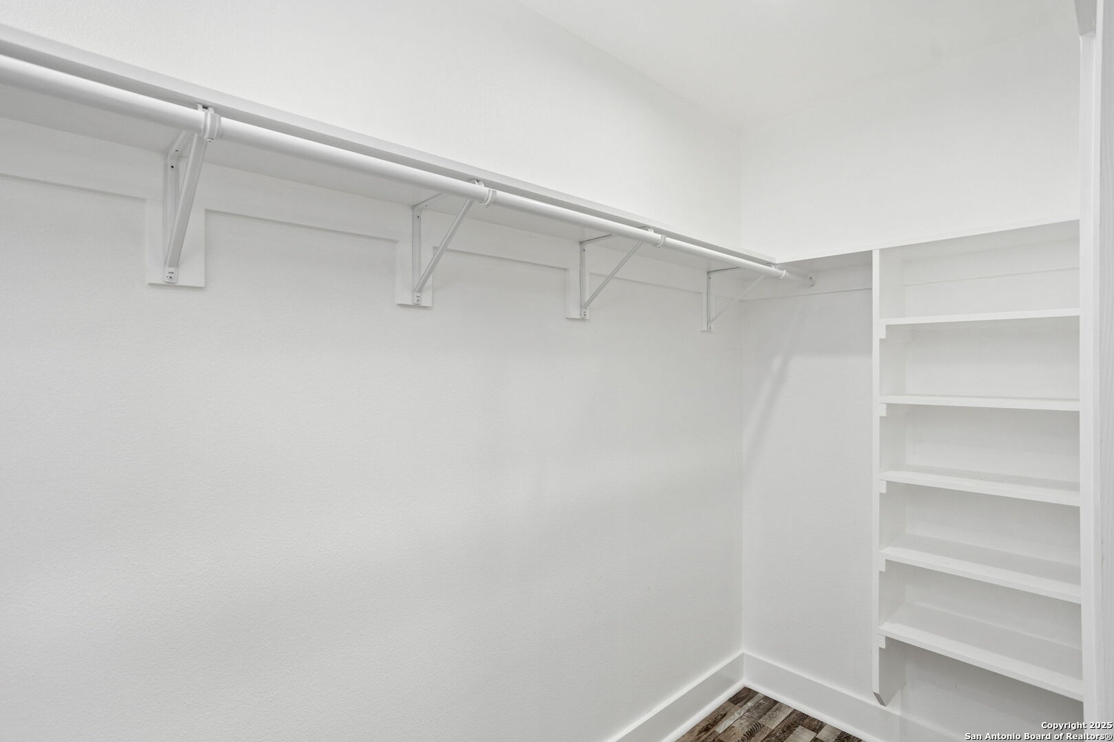 310 Creek Lane Poth, TX 78147 - Photo 20 of 32 a view of an empty walk in closet