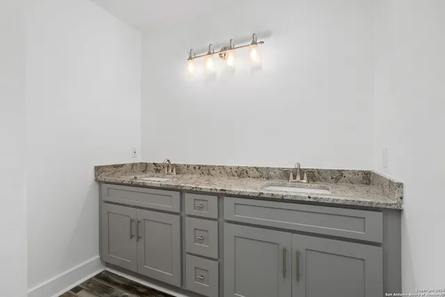 a bathroom with a toilet and a sink