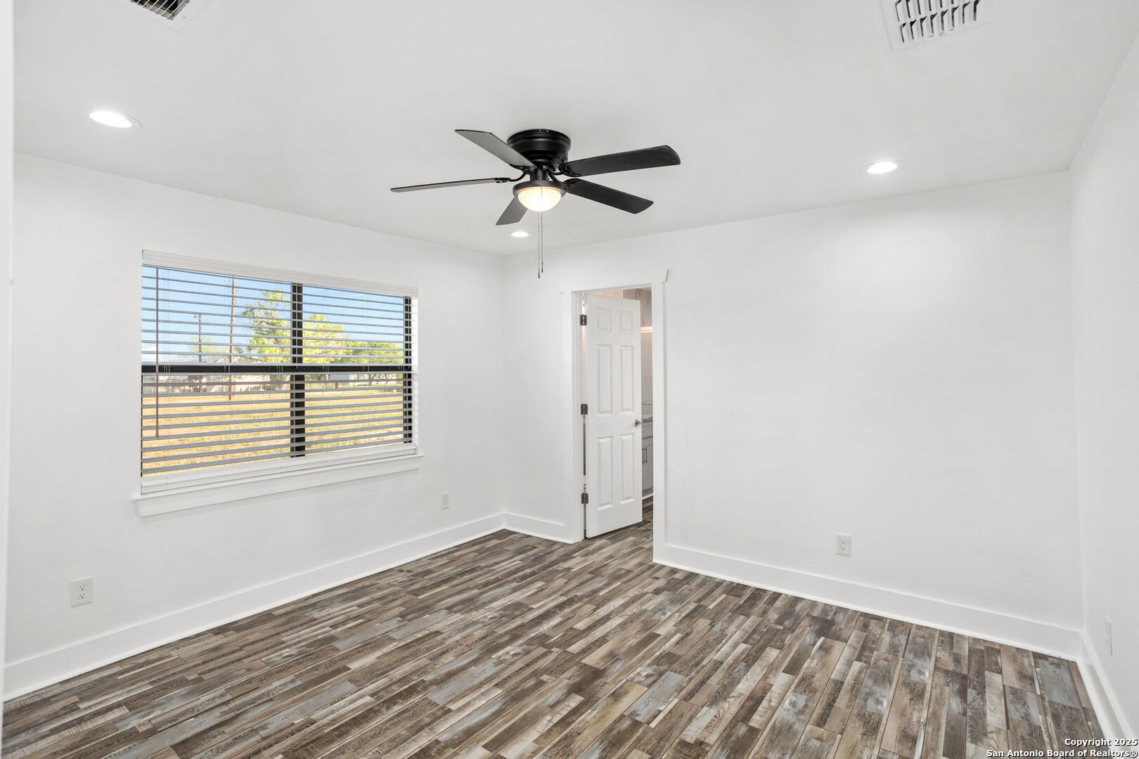310 Creek Lane Poth, TX 78147 - Photo 29 of 32 a view of an empty room with a window