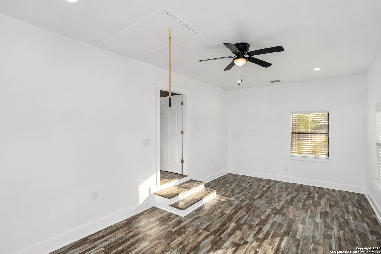 310 Creek Lane Poth, TX 78147 - Photo 31 of 32 a bedroom with a bed and a window