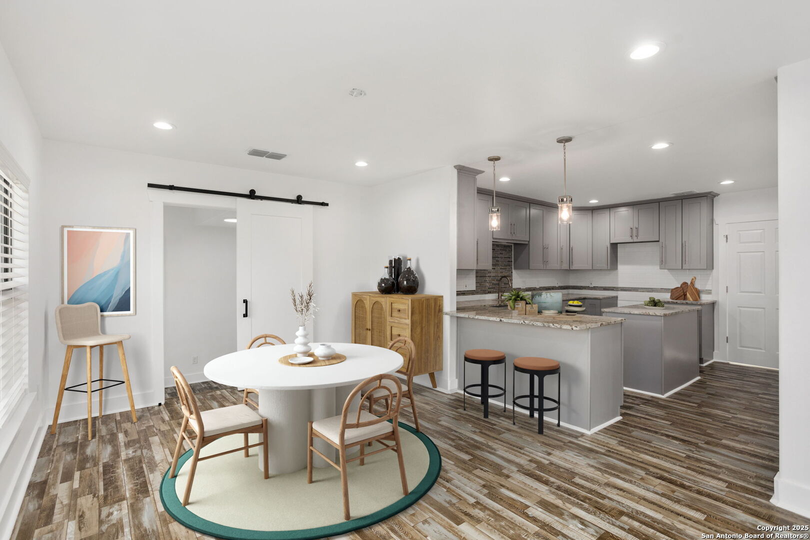310 Creek Lane Poth, TX 78147 - Photo 6 of 32 a kitchen with a dining table chairs and view living room