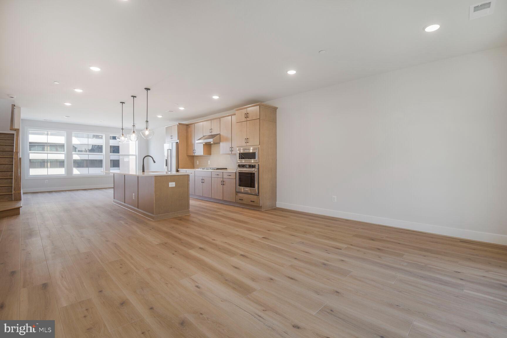 6020 Montrose Road North Bethesda, MD 20852 - Photo 17 of 27 a view of a kitchen with wooden floor