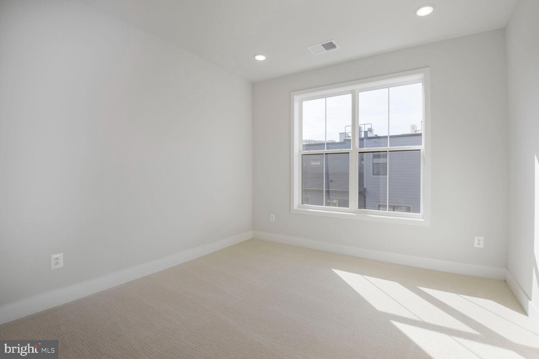 6020 Montrose Road North Bethesda, MD 20852 - Photo 22 of 27 an empty room with a window