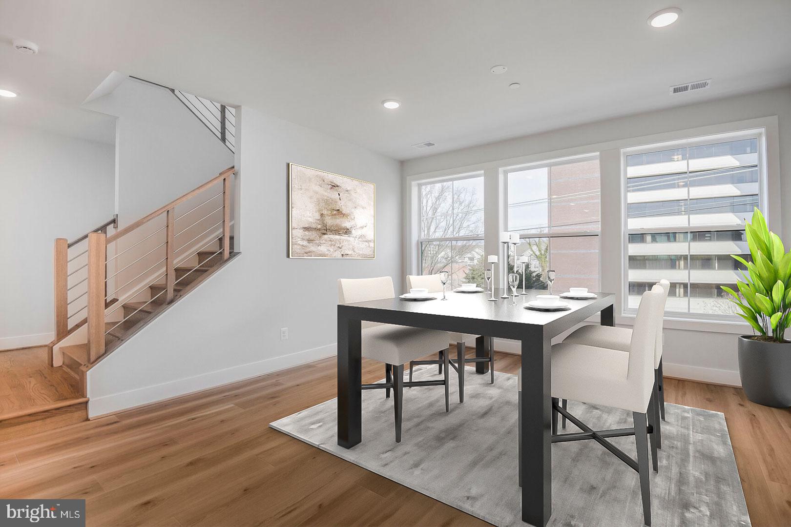 6020 Montrose Road North Bethesda, MD 20852 - Photo 3 of 27 a view of a dining room with furniture window and wooden floor