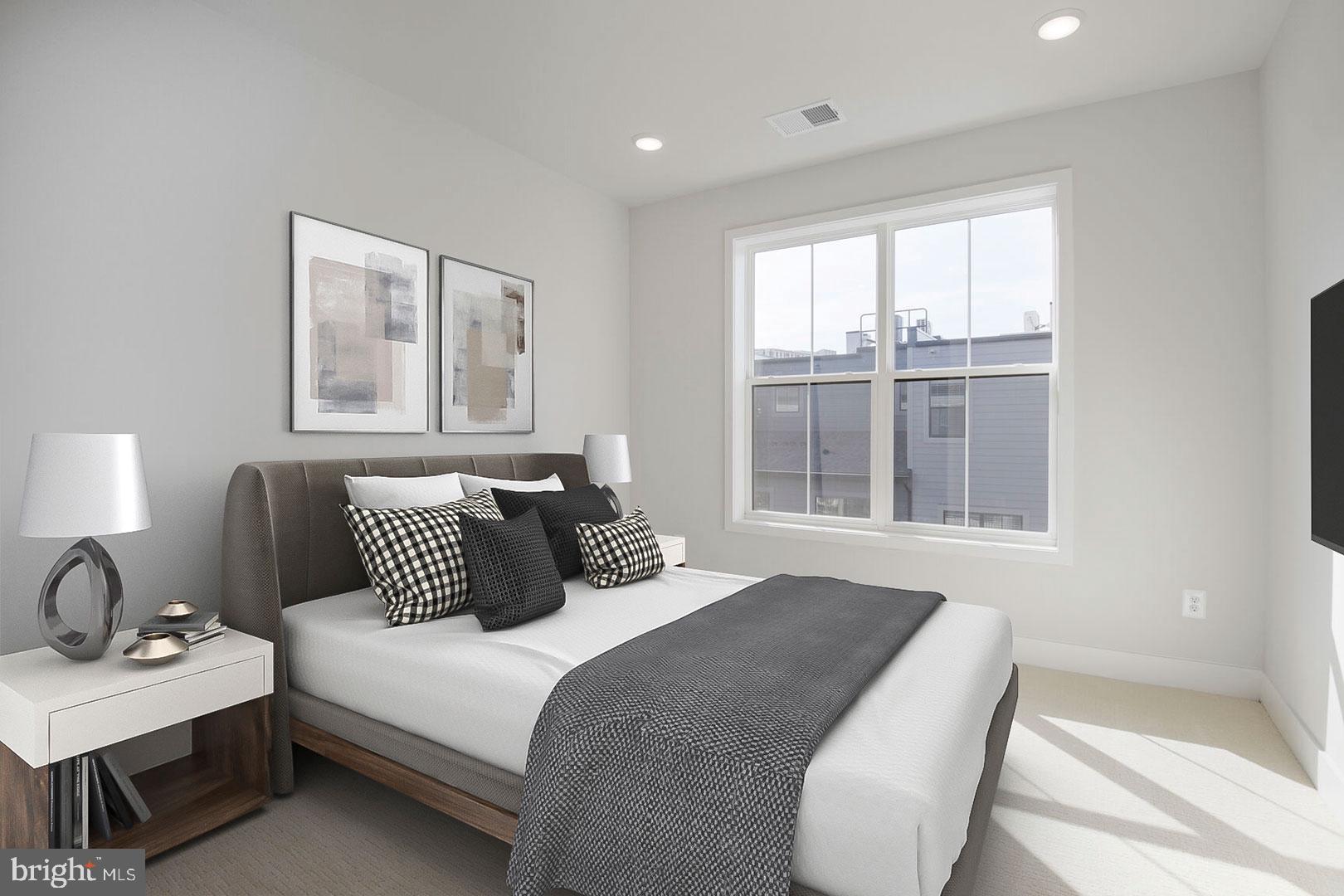 6020 Montrose Road North Bethesda, MD 20852 - Photo 8 of 27 a bedroom with bed and window