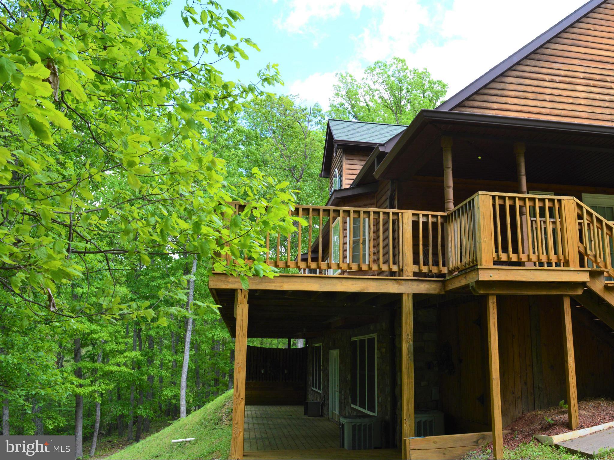 495 McCubbin Road Winchester, VA 22603 - Photo 28 of 29 a view of house with outdoor space and sitting area