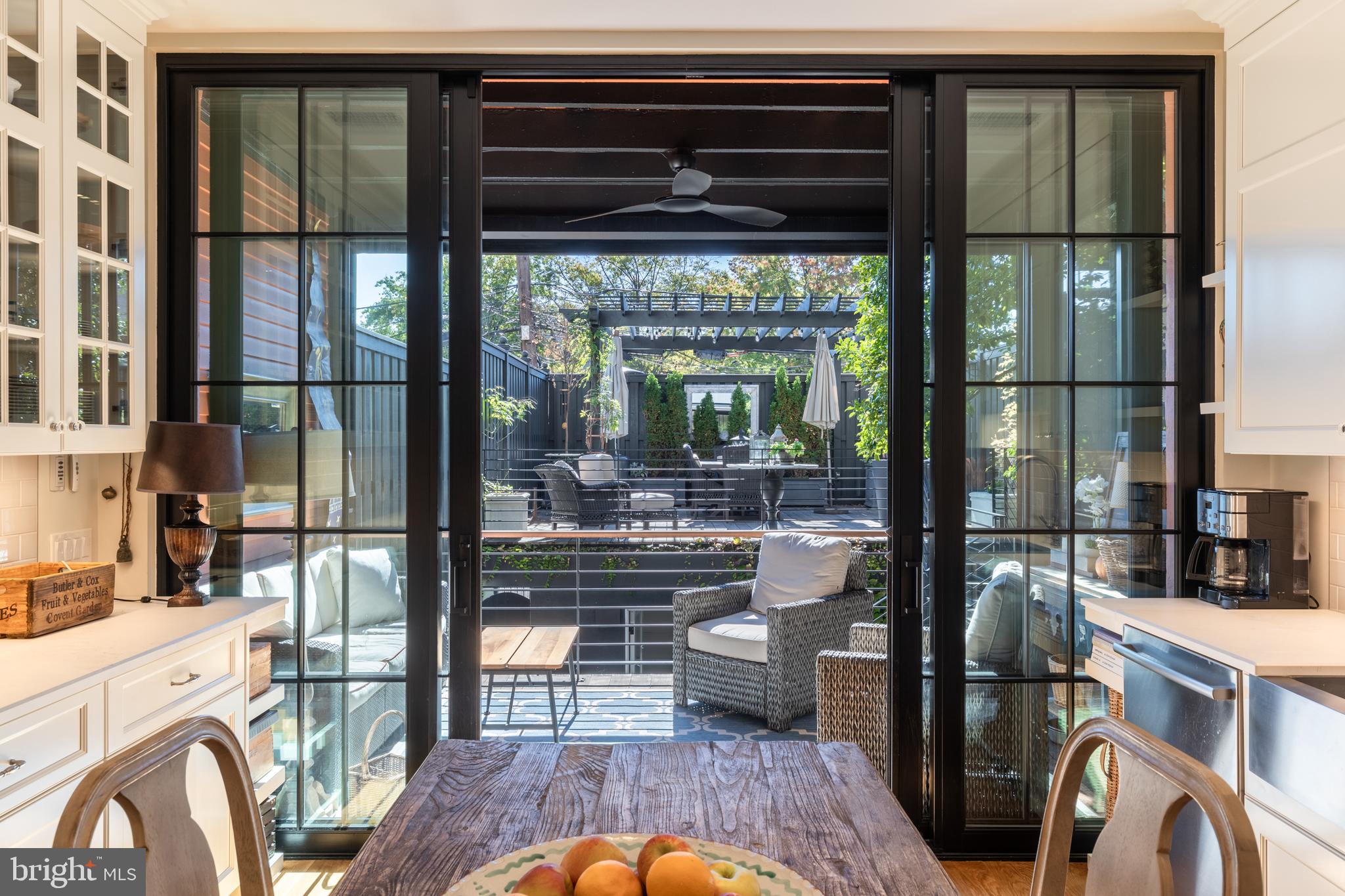 1854 Kalorama Road Northwest Washington, DC 20009 - Photo 15 of 43 Sliding glass doors for indoor/outdoor living