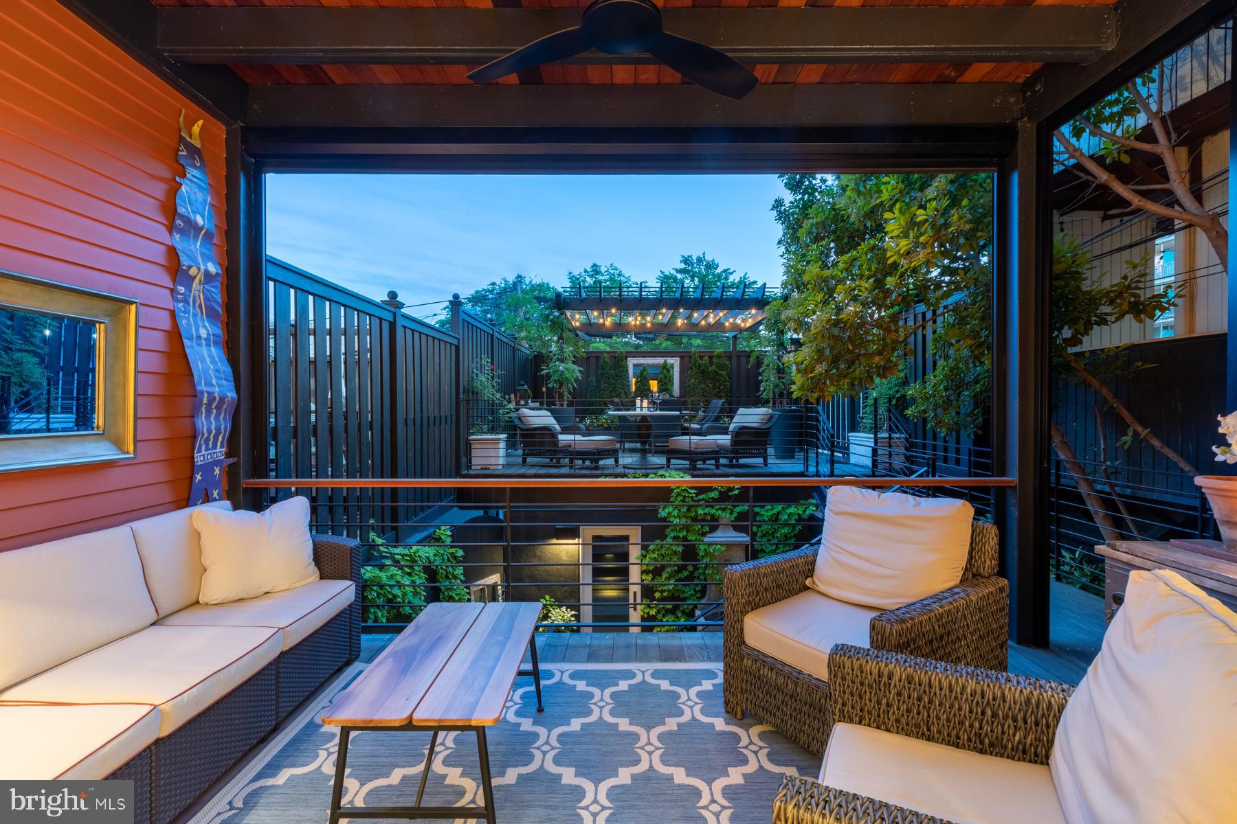 1854 Kalorama Road Northwest Washington, DC 20009 - Photo 16 of 43 Covered deck with retractable Phantom screen