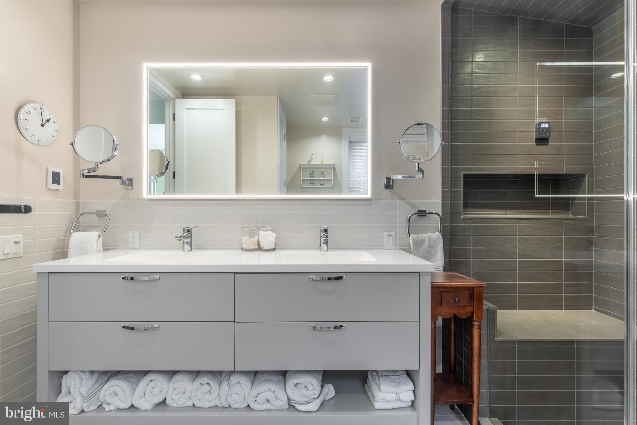 1854 Kalorama Road Northwest Washington, DC 20009 - Photo 30 of 43 Double vanity, steam shower and towel warming rack