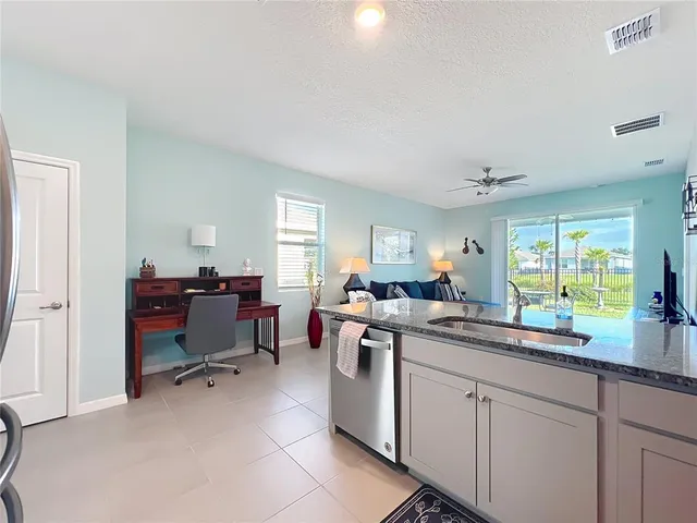 a view of kitchen and sink