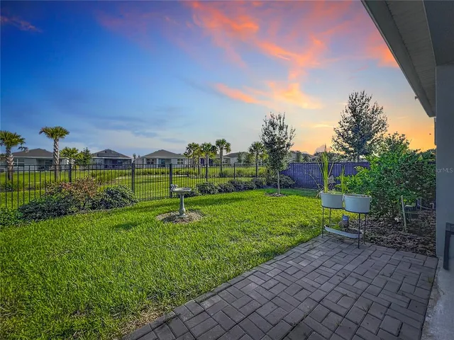 a view of a golf course with a garden