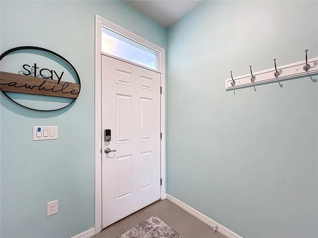 a view of a room with rack on the wall