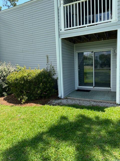 101 Old Ferry Road, Unit 5B Shalimar, FL 32579 - Photo 13 of 19 a view of a house with garden and yard