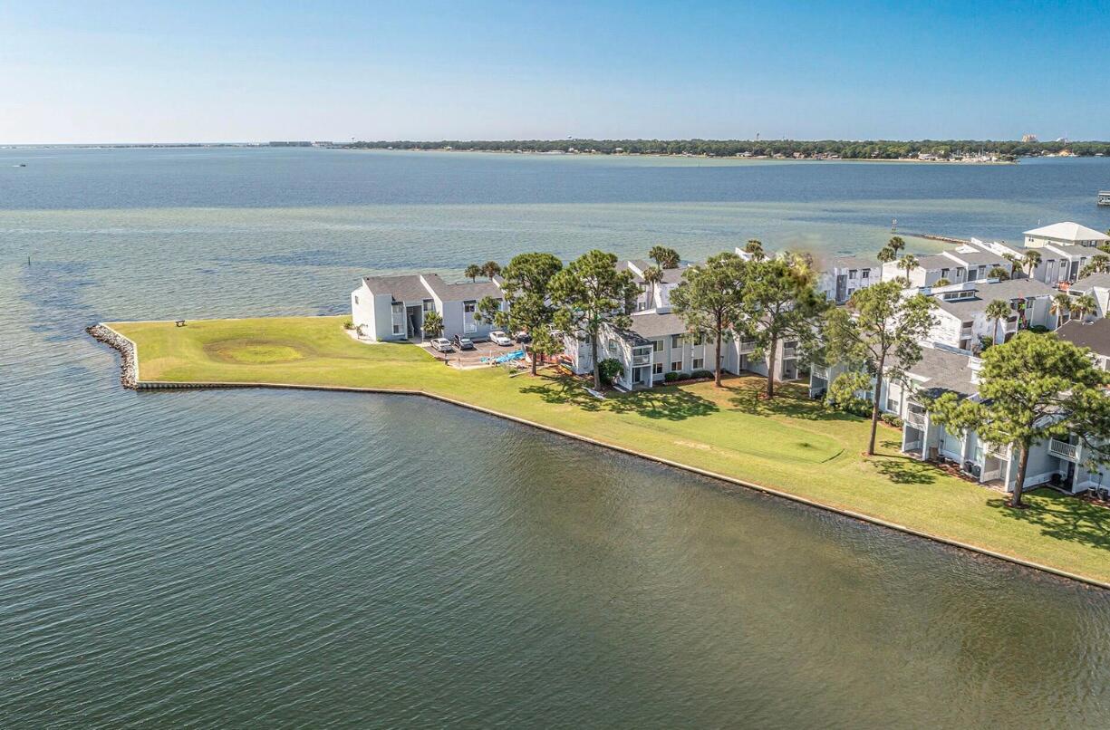 101 Old Ferry Road, Unit 5B Shalimar, FL 32579 - Photo 18 of 19 a view of a swimming pool with an ocean view