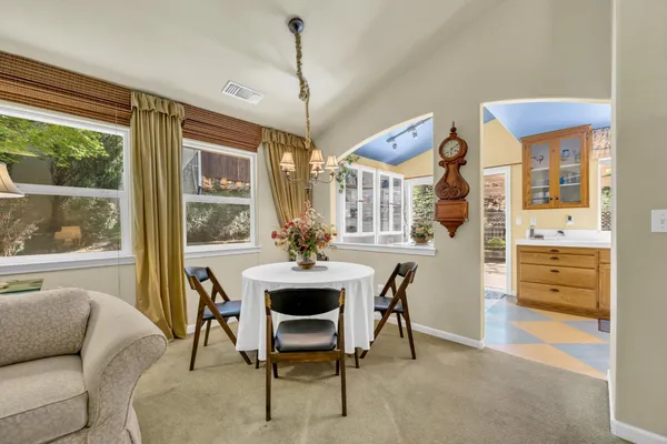 a view of a livingroom with furniture and window
