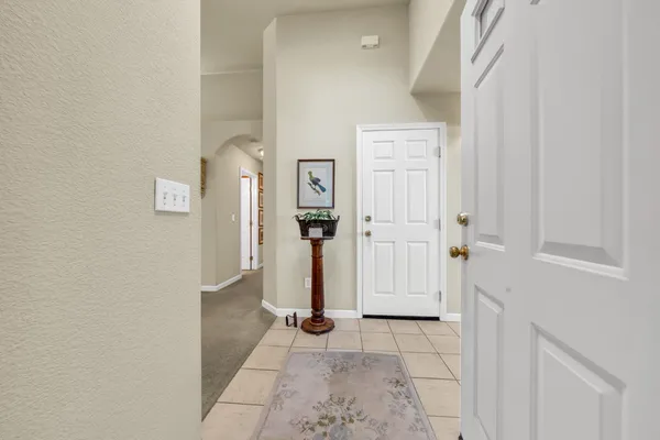 a view of empty room with windows