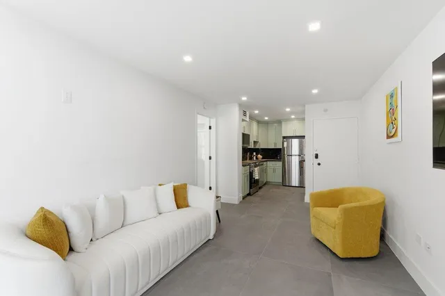 a living room with furniture and a couch