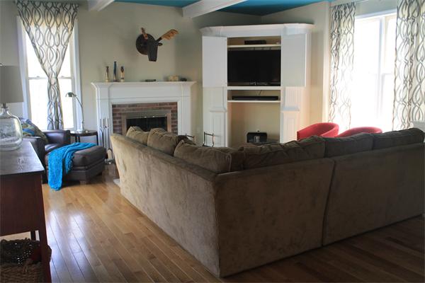 19 Pendulum Pass Hopkinton, MA 01748 - Photo 12 of 30 a living room with furniture and a fireplace