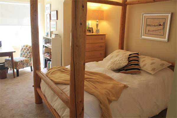 19 Pendulum Pass Hopkinton, MA 01748 - Photo 16 of 30 a bedroom with a bed and cabinet